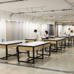 Retail countertops from Caesarstone. Black steel legs and stone surface